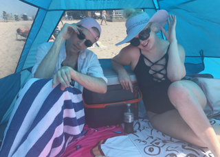 The author (who reapplied twice) and his friend, enjoying the shade and not harming anyone else while doing it.